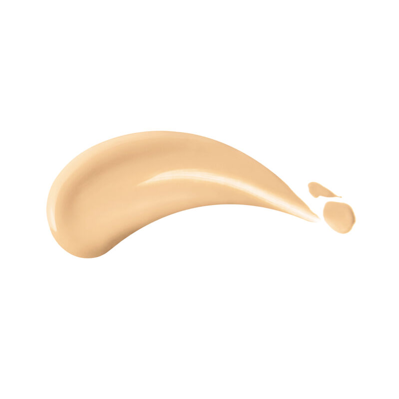 A  swatch of the Shiseido Revitalessence Skin Glow Foundation SPF 30 in shade 210 Birch &ndash; a golden tone for light skin &ndash; against a white background, showing the product&rsquo;s serum-like texture that weightlessly glides into skin for a glowing makeup finish